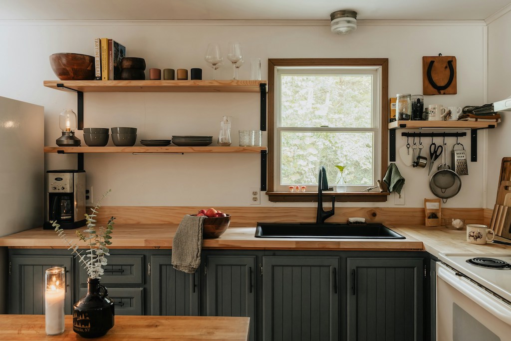 make an open-layout kitchen feel more intimate